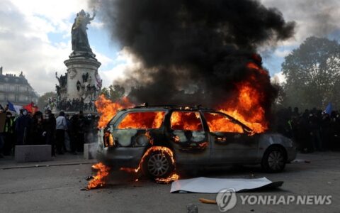 yna paris riot car burns 20261017 yna wm